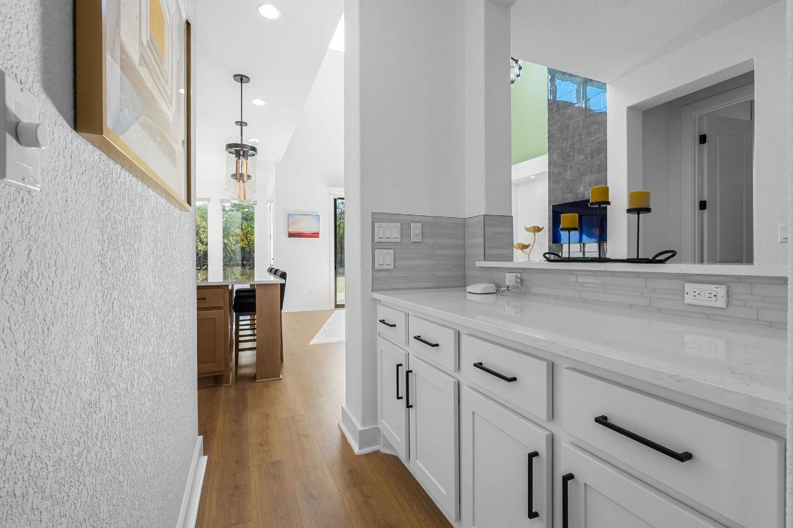 4612 Destination Way Jonestown, TX 78645 - Photo 9 of 37 a bathroom with a sink and a mirror