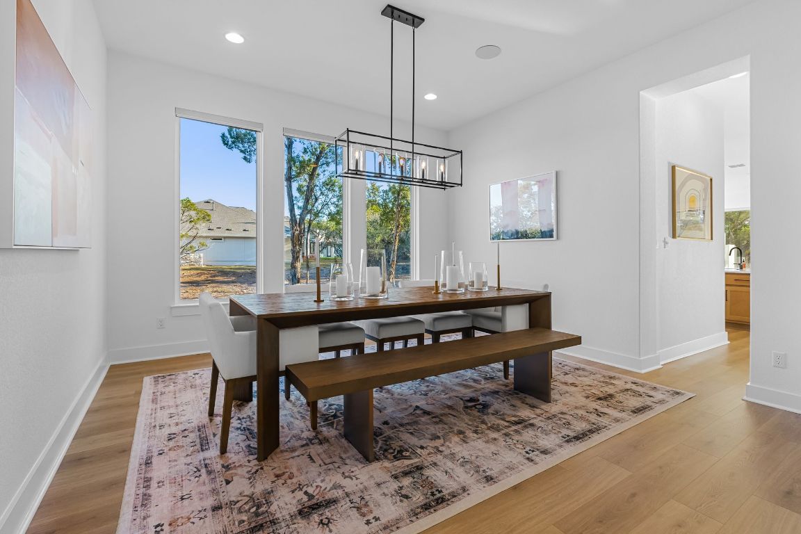 4612 Destination Way Jonestown, TX 78645 - Photo 10 of 37 a living room with furniture a window and a table