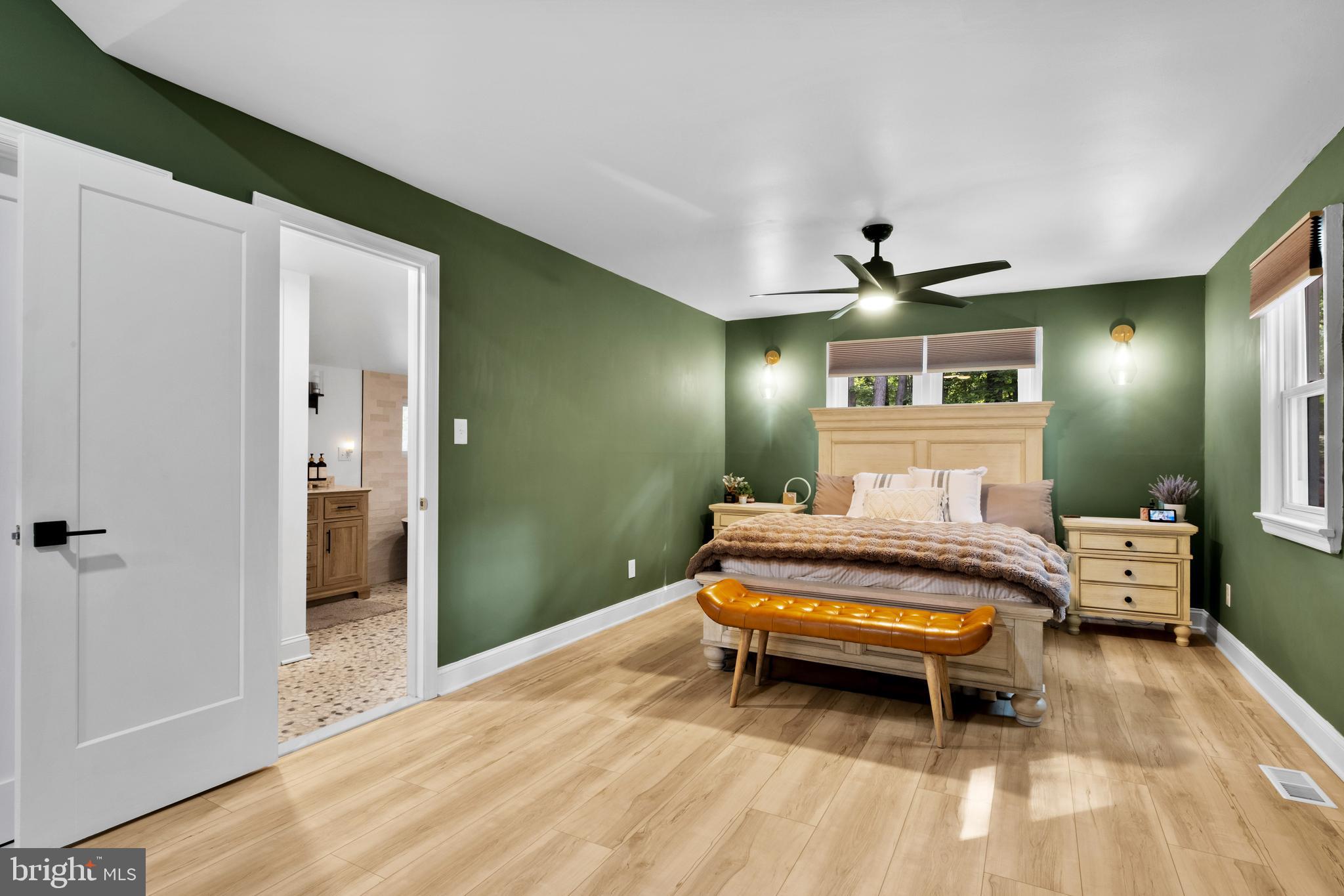 634 Tabernacle Road Medford, NJ 08055 - Photo 11 of 46 a living room with a bed furniture and a window