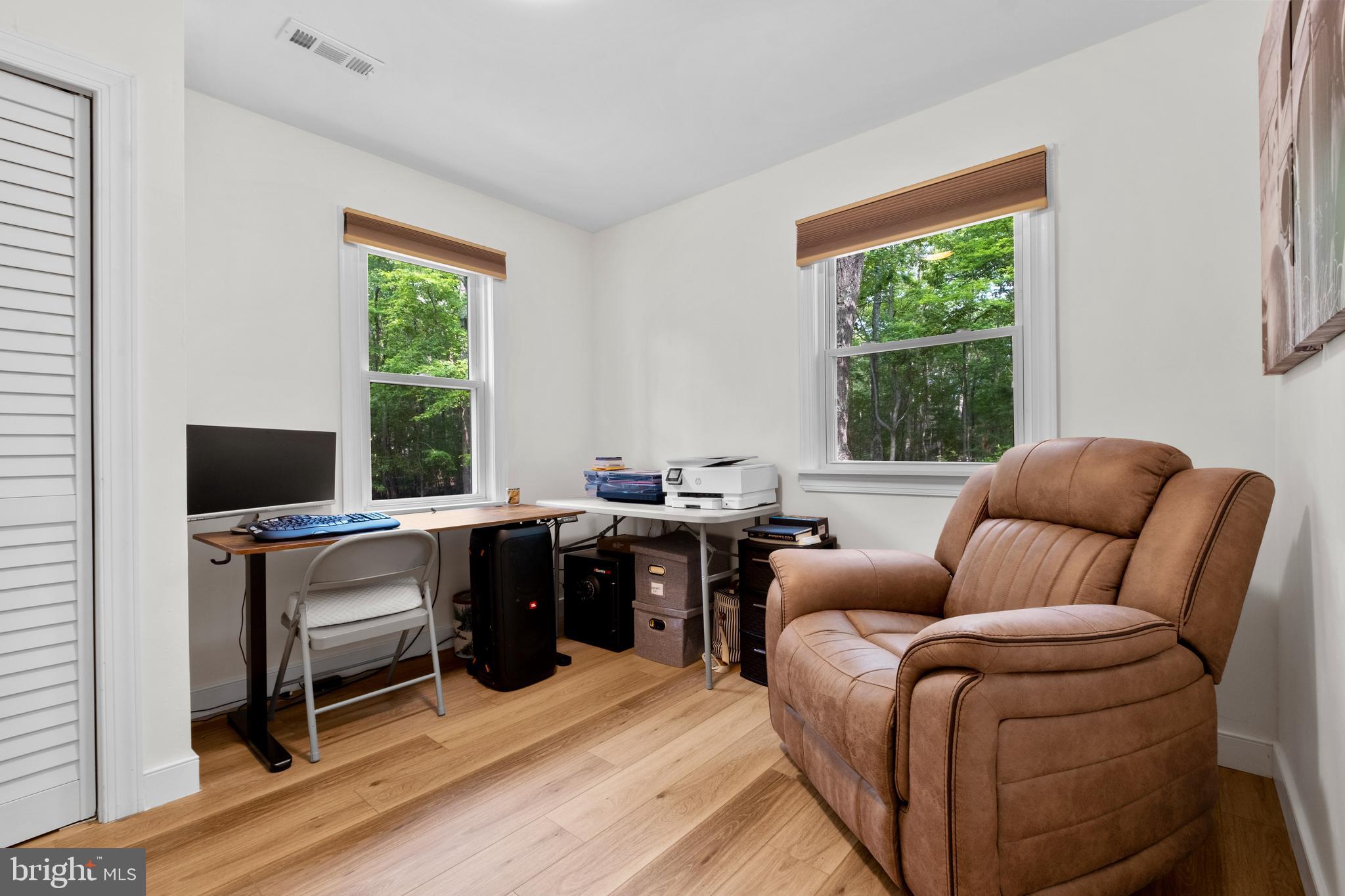 634 Tabernacle Road Medford, NJ 08055 - Photo 26 of 46 a view of a livingroom with workspace and a window