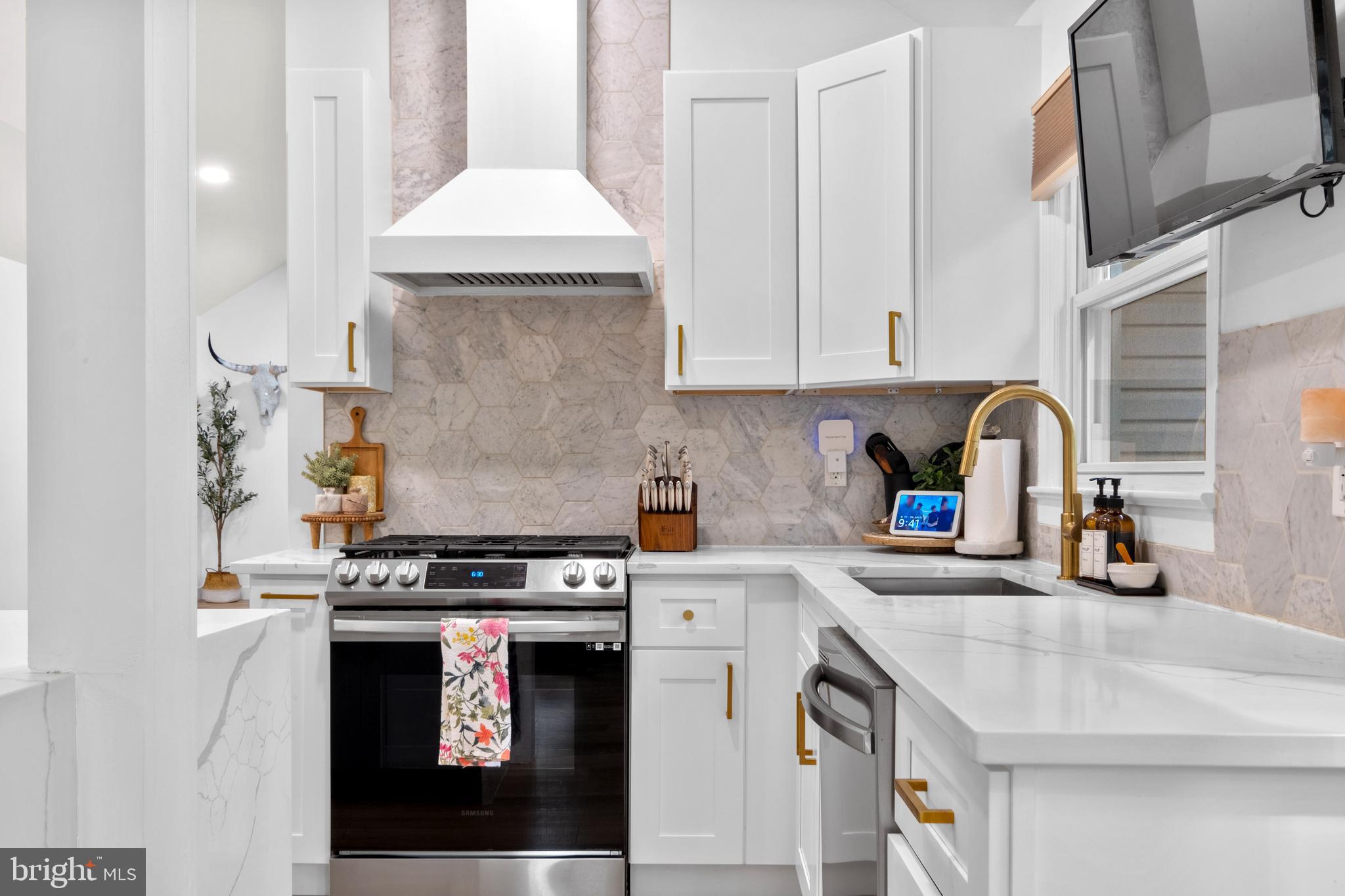 634 Tabernacle Road Medford, NJ 08055 - Photo 4 of 46 a kitchen with stainless steel appliances granite countertop a stove and a sink