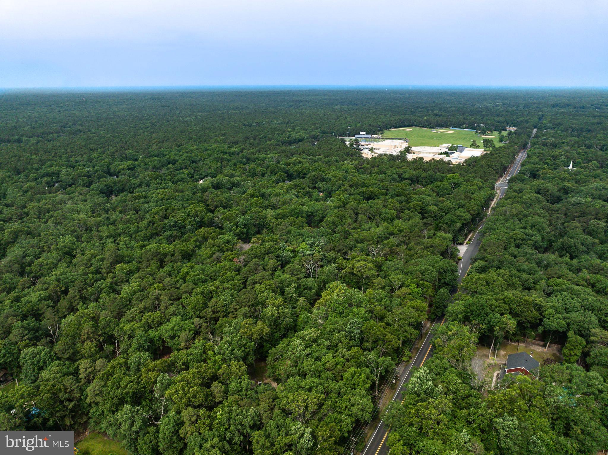 634 Tabernacle Road Medford, NJ 08055 - Photo 43 of 46 an aerial view of a house with a yard