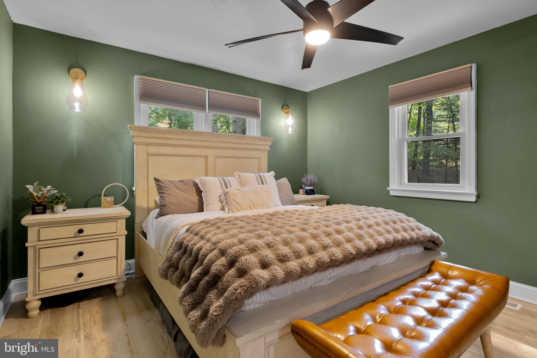 634 Tabernacle Road Medford, NJ 08055 - Photo 10 of 46 a bedroom with a bed and a tv