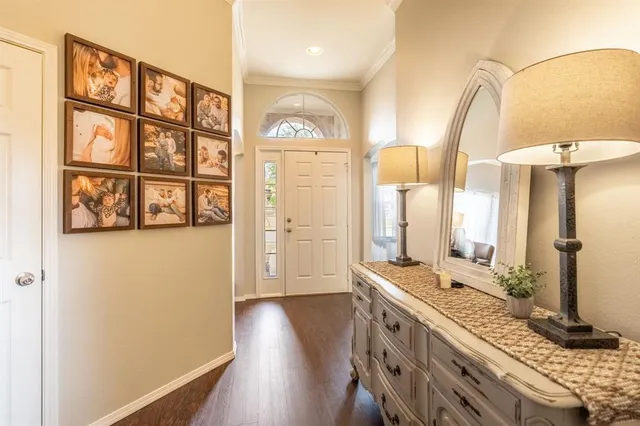 a spacious bathroom with a double vanity sink and a mirror