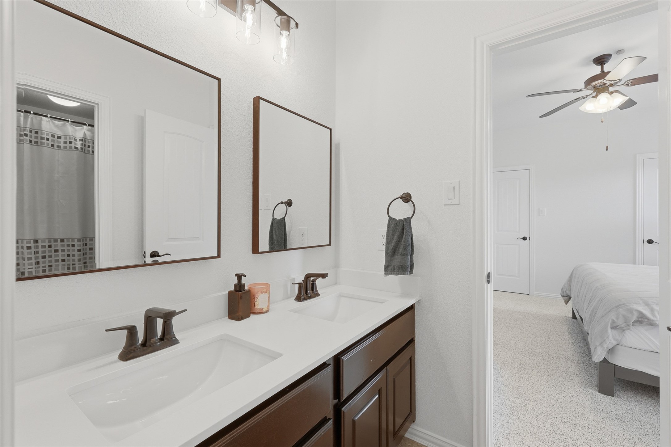 6835 Preston Grove Drive Spring, TX 77389 - Photo 39 of 49 a bathroom with a sink and a mirror