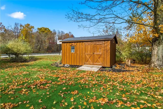 a view of a backyard of the house
