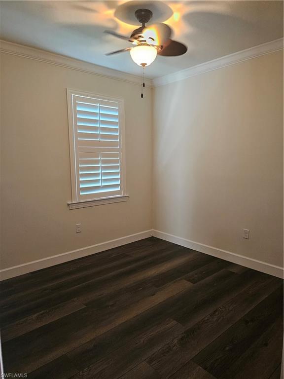 10840 Rutherford Road Fort Myers, FL 33913 - Photo 17 of 35 Spare room with dark hardwood / wood-style flooring, a healthy amount of sunlight, and ceiling fan