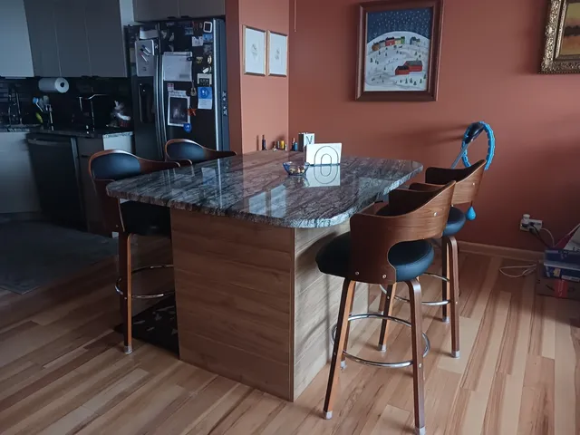 a table and chairs in a room