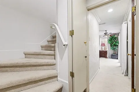 a bedroom with a bed and walk in closet