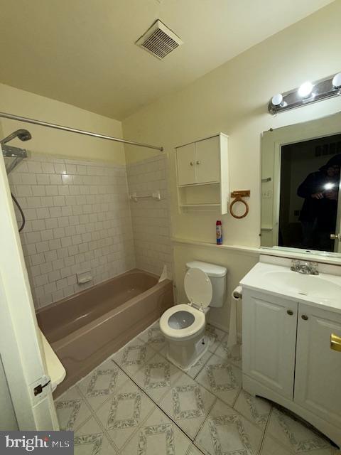 828 Windstream Way, Unit 828C Edgewood, MD 21040 - Photo 7 of 11 a bathroom with a sink a toilet and shower