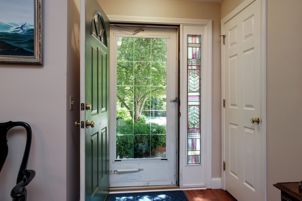 56 Pine Hill Boulevard, Unit 72 Mashpee, MA 02649 - Photo 7 of 12 a view of a window in an empty room