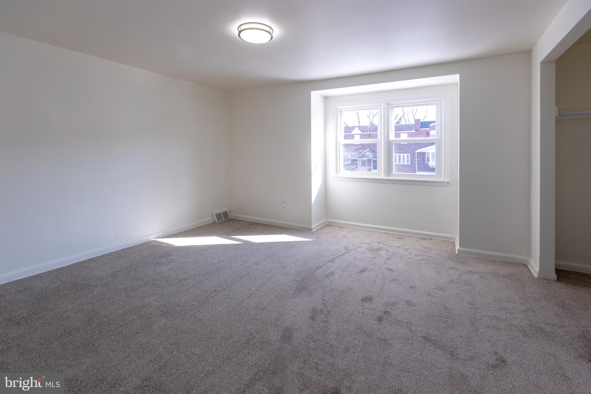 1218 Harshaw Road Brookhaven, PA 19015 - Photo 8 of 21 an empty room with windows