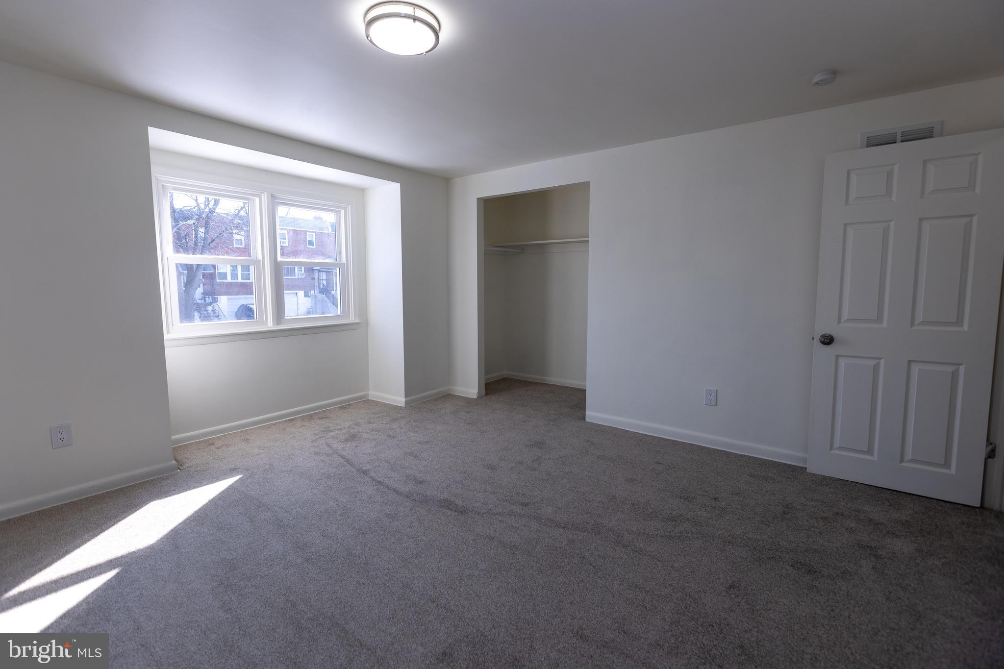 1218 Harshaw Road Brookhaven, PA 19015 - Photo 9 of 21 an empty room with windows