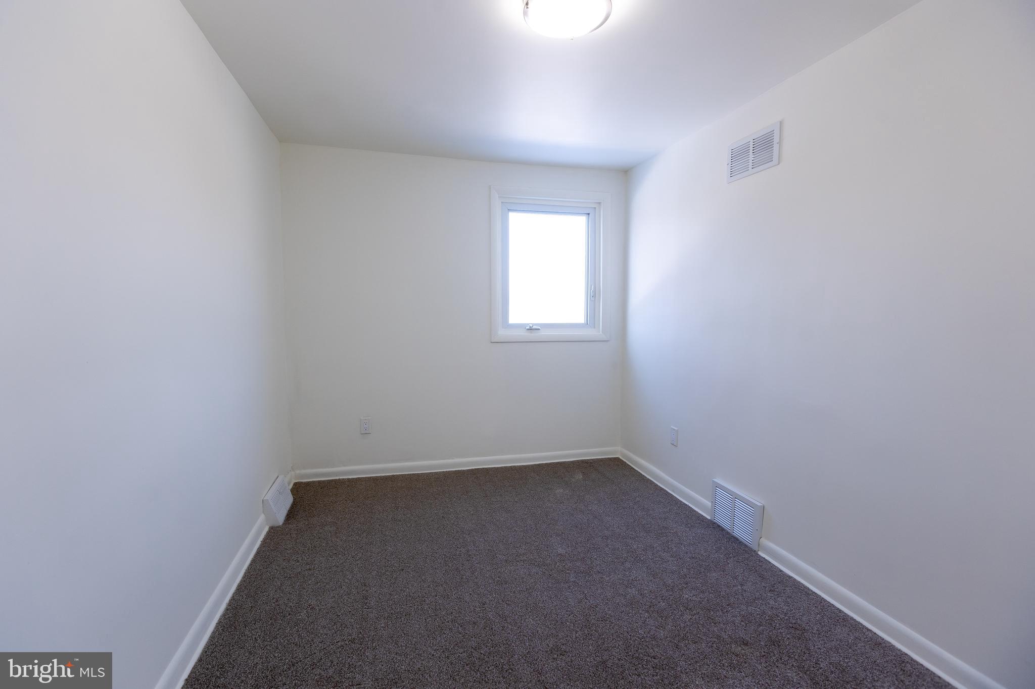 1218 Harshaw Road Brookhaven, PA 19015 - Photo 10 of 21 an empty room with a window