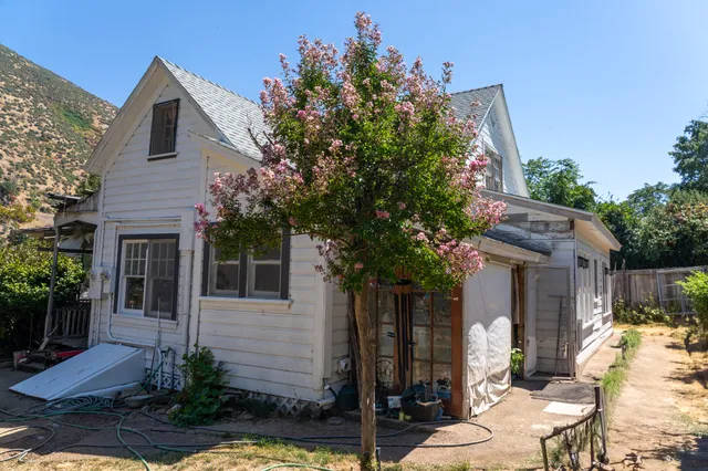 a living room with furniture or couch and a flat screen tv