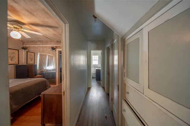 a bathroom with a sink a mirror and a shower