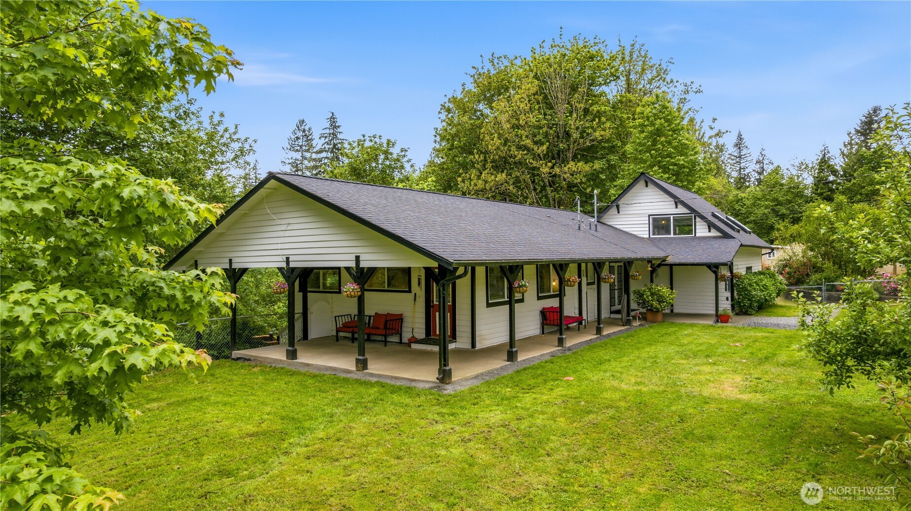 24522 Cromwell Road Monroe, WA 98272 - Photo 1 of 40 a house view with a garden space
