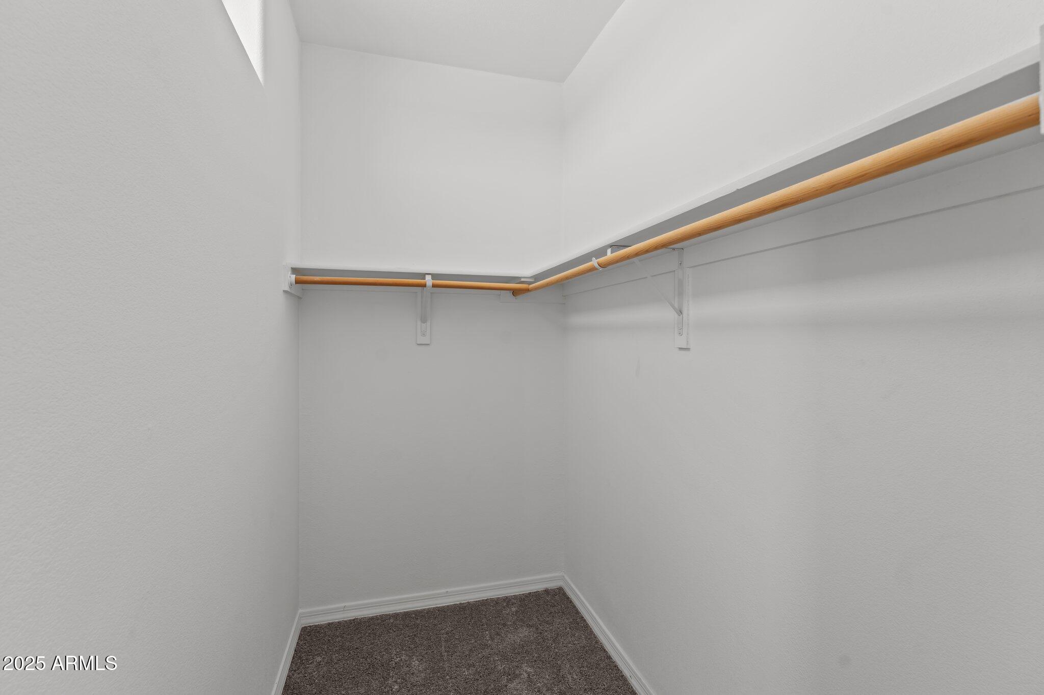 20909 West Bradley Road Wittmann, AZ 85361 - Photo 14 of 37 a close up view of racks on the wall