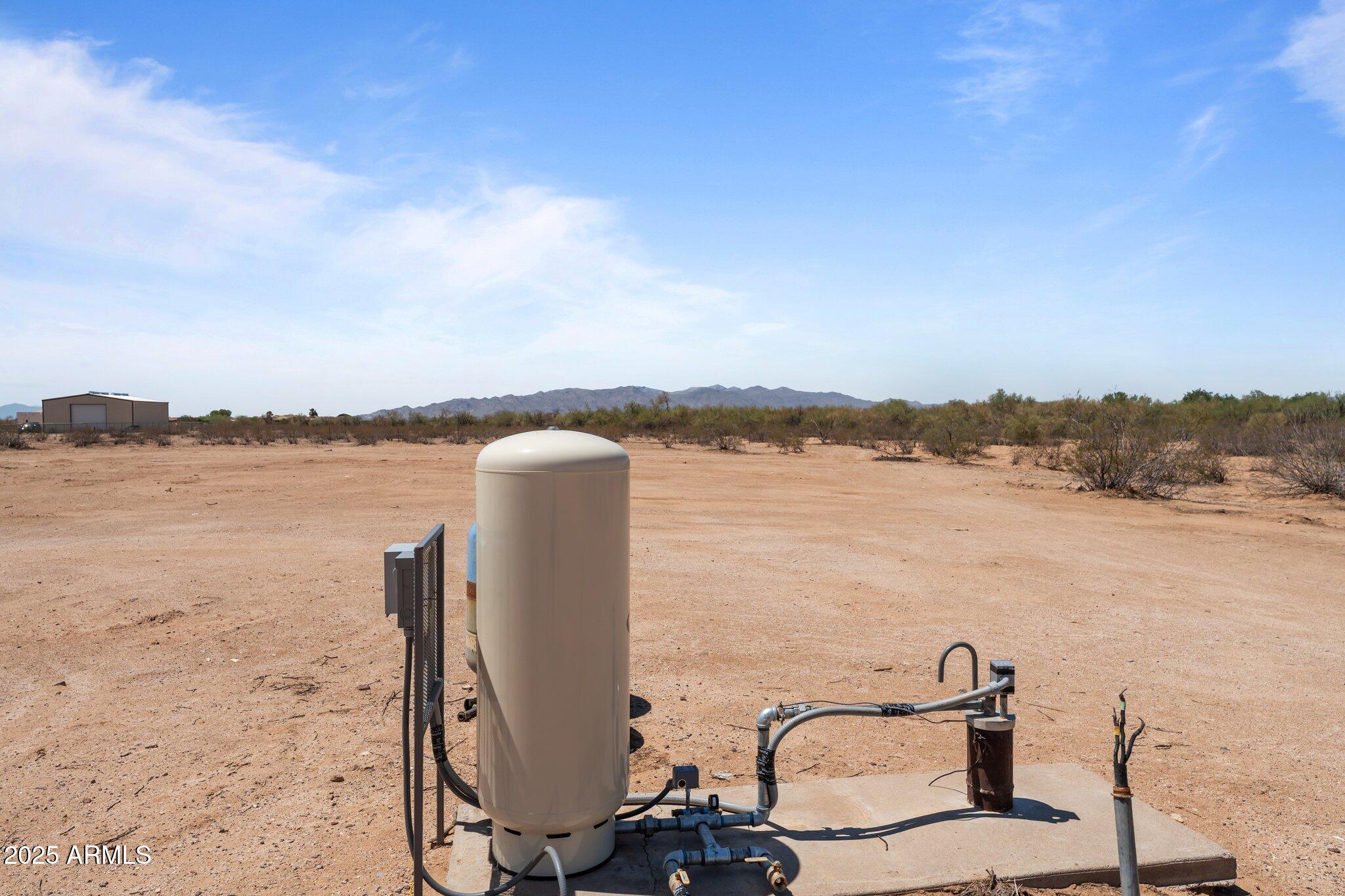 20909 West Bradley Road Wittmann, AZ 85361 - Photo 7 of 37 a view of a lake with sitting space