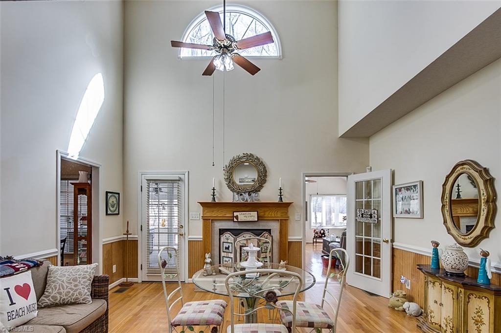 1618 Penny Road High Point, NC 27265 - Photo 7 of 30 Soaring ceilings, natural light from the Palladium Window, bathes the Living Room!