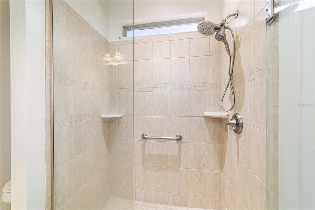 9710 Southwest 76th Lane Road Ocala, FL 34481 - Photo 27 of 45 a bathroom with a shower