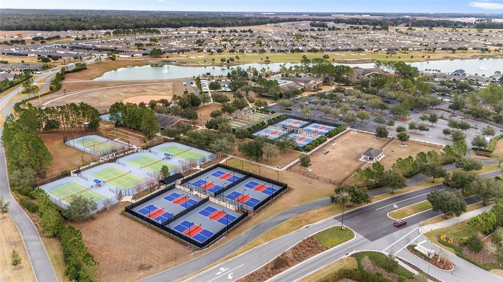 9710 Southwest 76th Lane Road Ocala, FL 34481 - Photo 45 of 45 an aerial view of residential houses with outdoor space