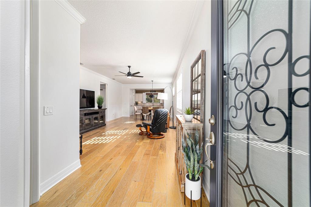 9710 Southwest 76th Lane Road Ocala, FL 34481 - Photo 5 of 45 a view of a room with gym equipment