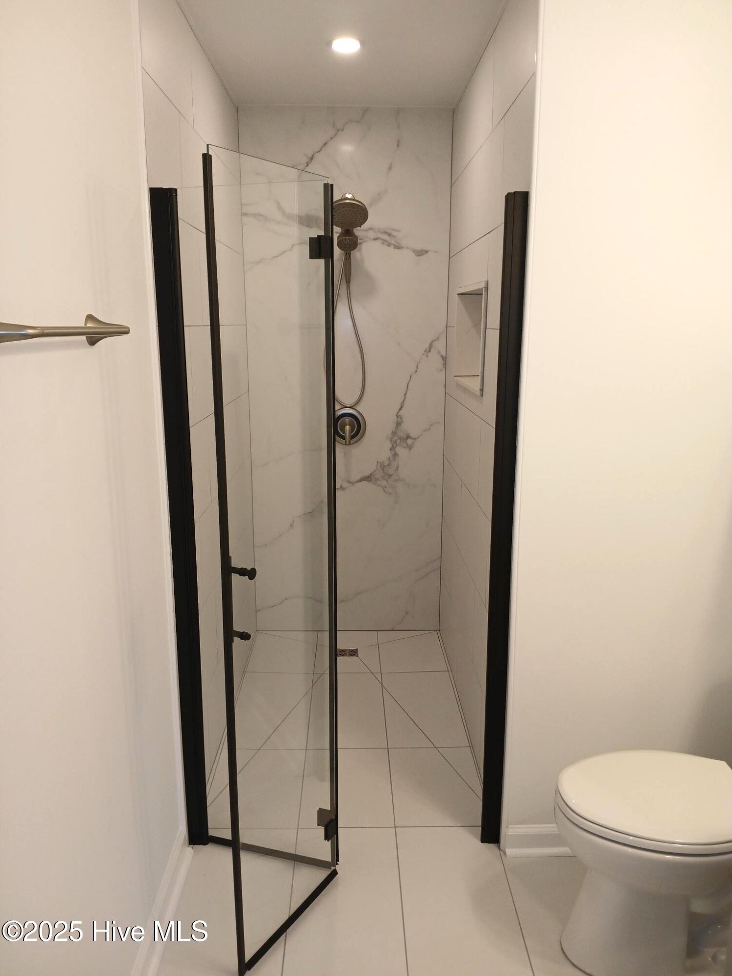 9166 Green Loop Road Northeast Leland, NC 28451 - Photo 15 of 17 9166 Green Loop Walk-In Shower