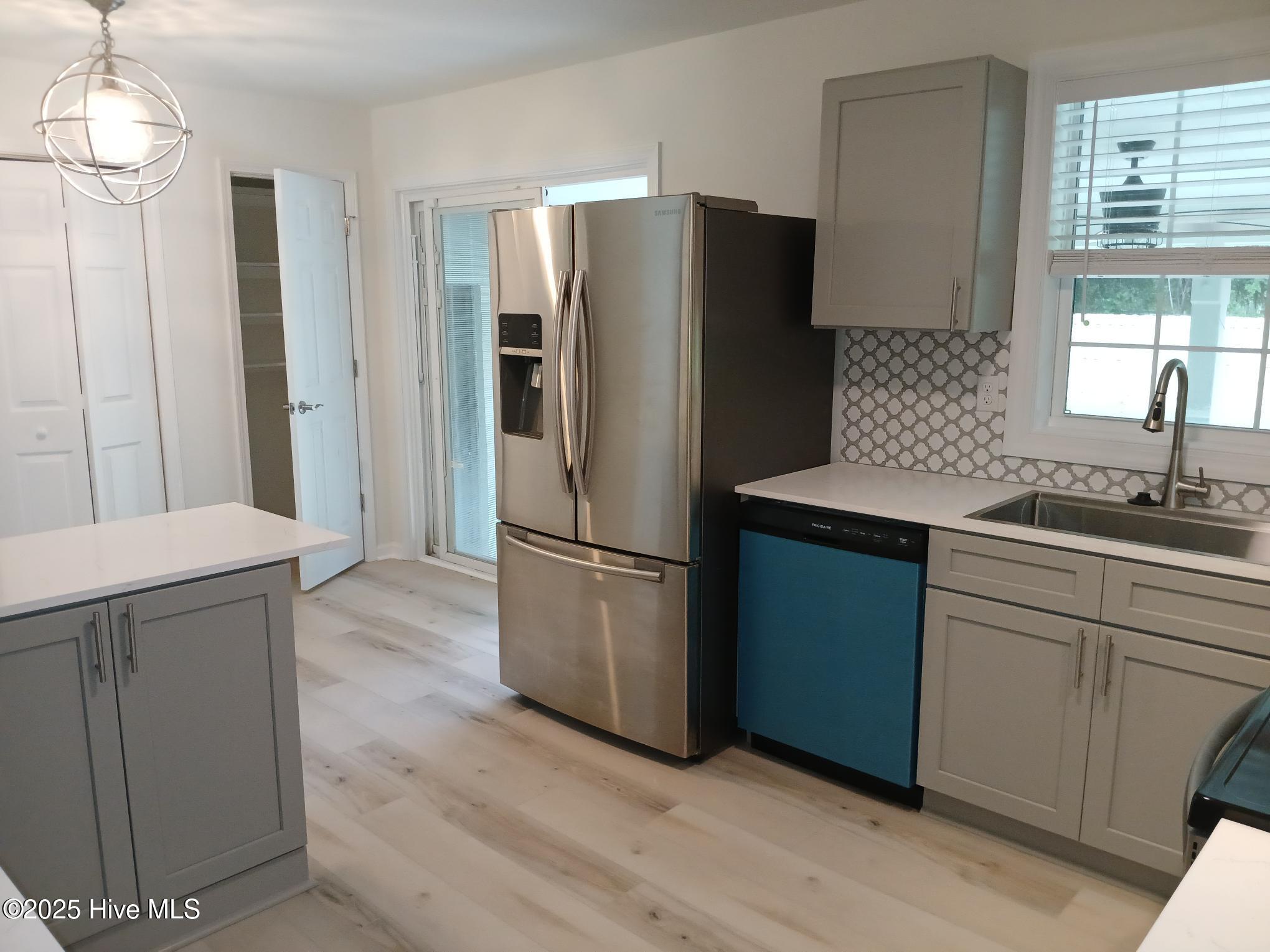 9166 Green Loop Road Northeast Leland, NC 28451 - Photo 7 of 17 9166 Green Loop Kitchen.2