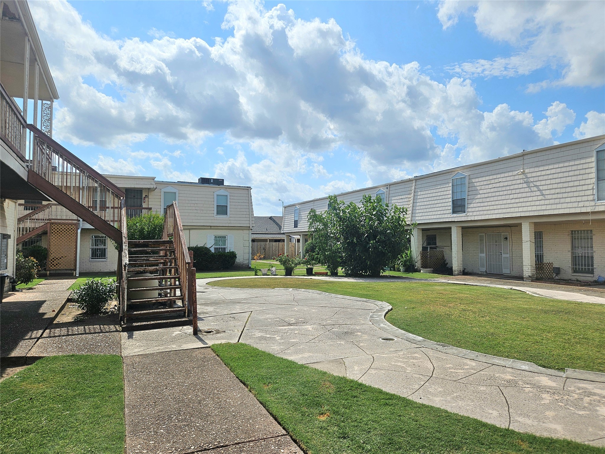 6201 Ranchester Drive, Unit 1 Houston, TX 77036 - Photo 1 of 26 a view of a house with a yard