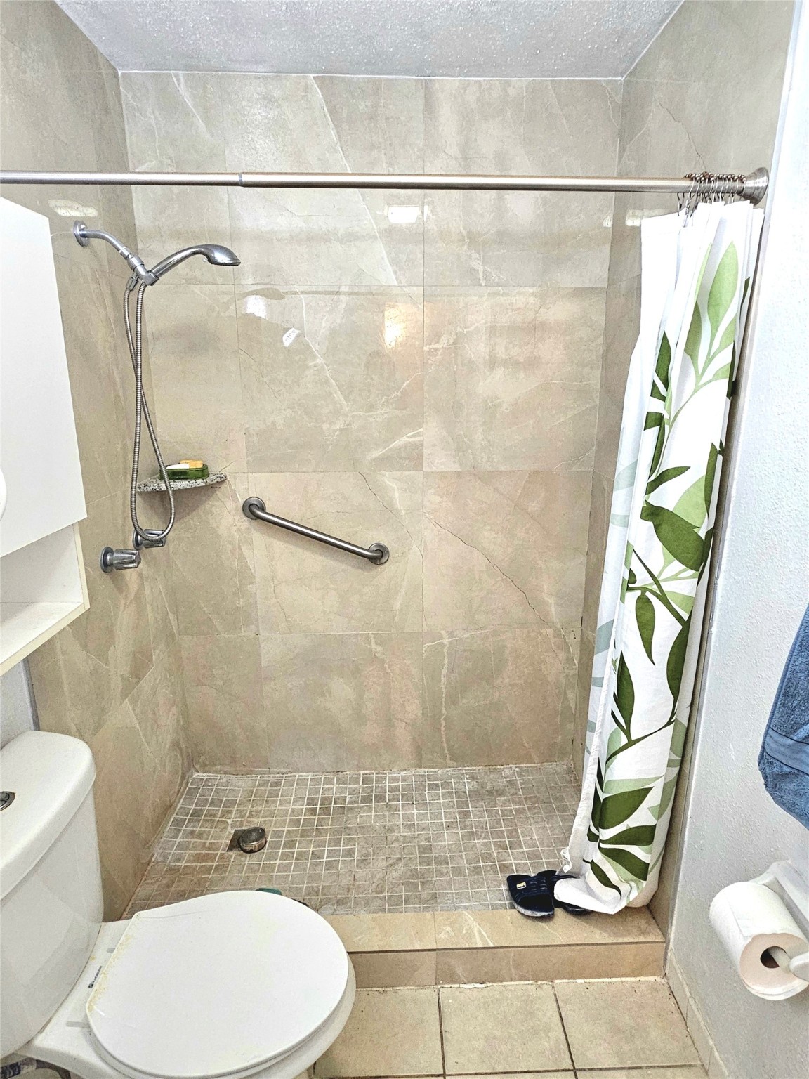 6201 Ranchester Drive, Unit 1 Houston, TX 77036 - Photo 15 of 26 a bathroom with a toilet and a shower