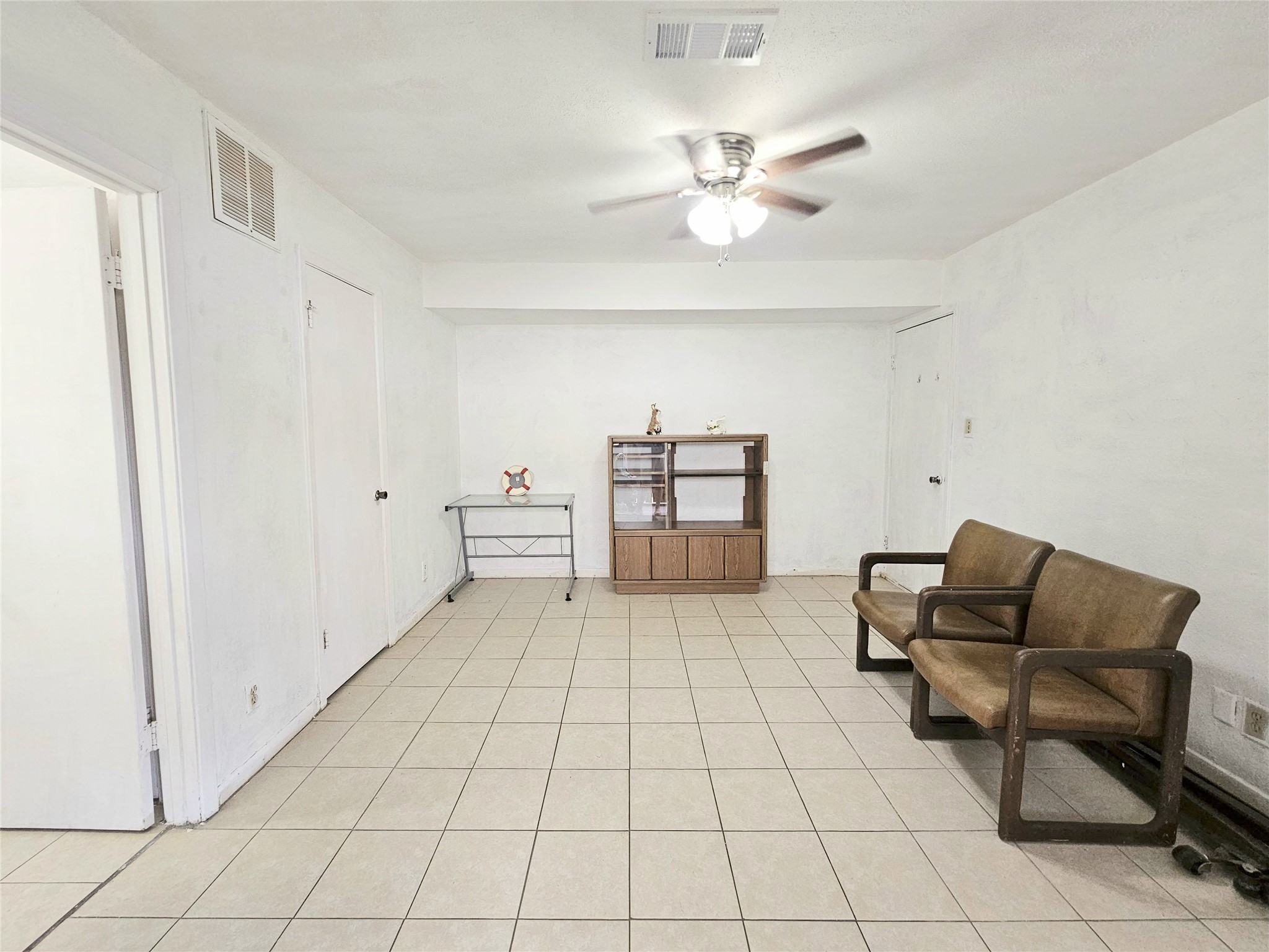 6201 Ranchester Drive, Unit 1 Houston, TX 77036 - Photo 17 of 26 a living room with furniture