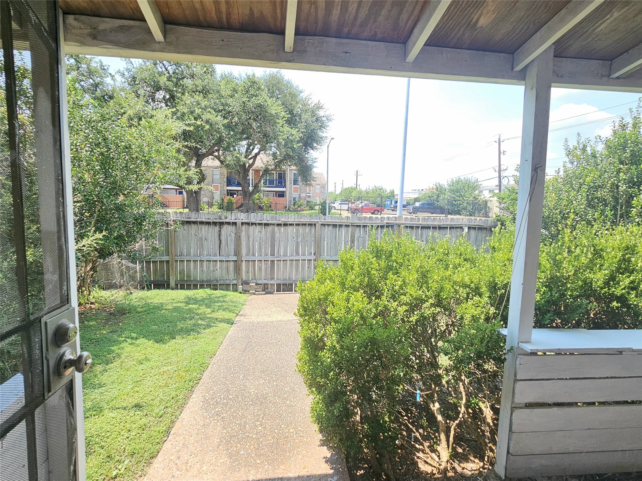 6201 Ranchester Drive, Unit 1 Houston, TX 77036 - Photo 24 of 26 a view of a backyard with a garden