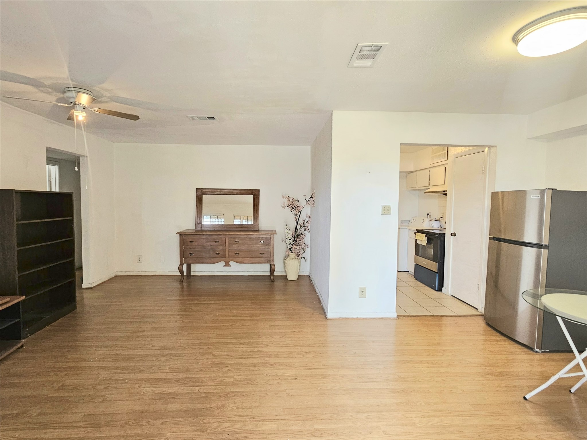 6201 Ranchester Drive, Unit 1 Houston, TX 77036 - Photo 6 of 26 a view of kitchen with furniture and refrigerator
