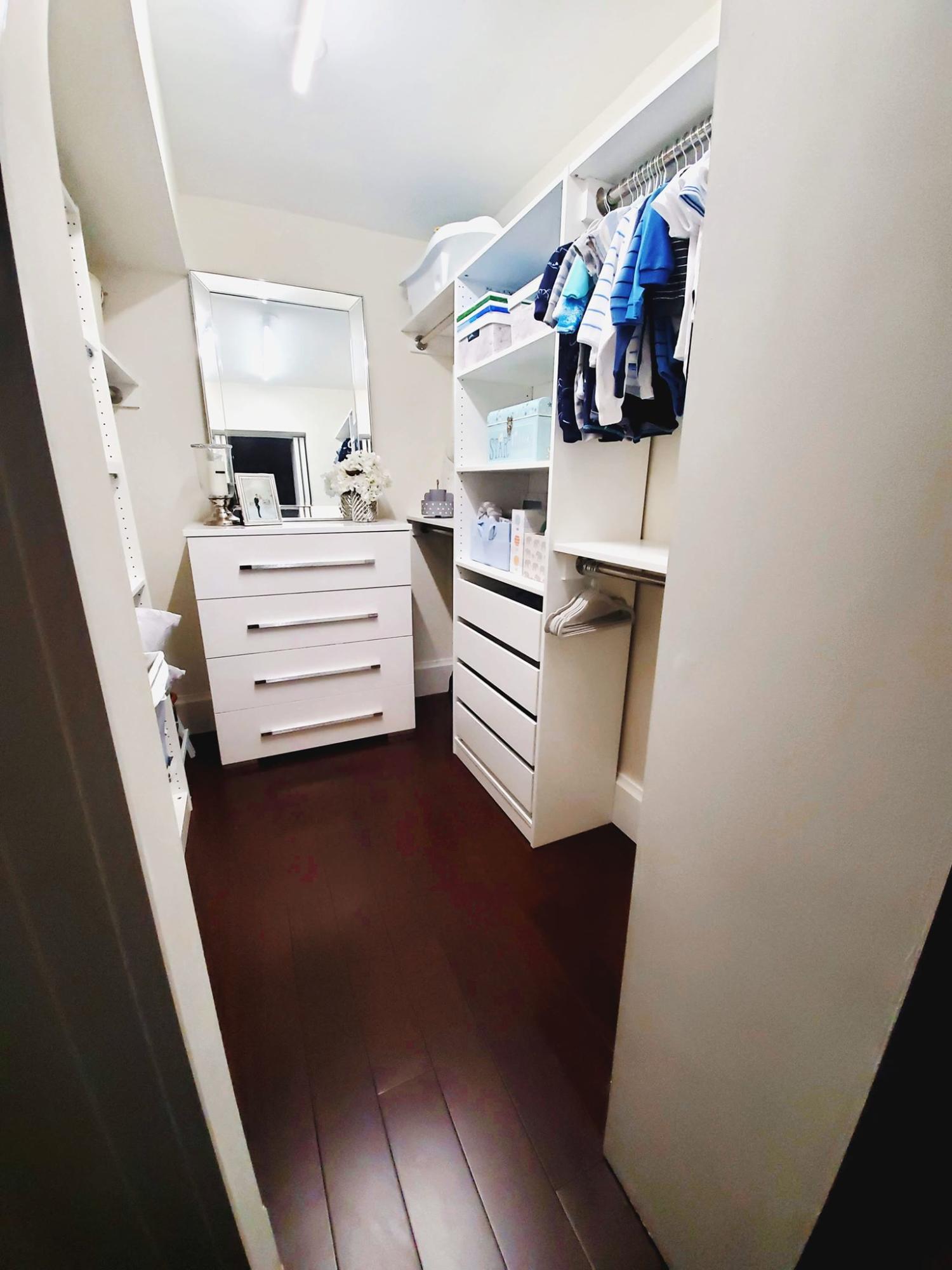 651 East Woolbright Road, Unit E204 Boynton Beach, FL 33435 - Photo 21 of 37 Guest Bedroom Walking Closet