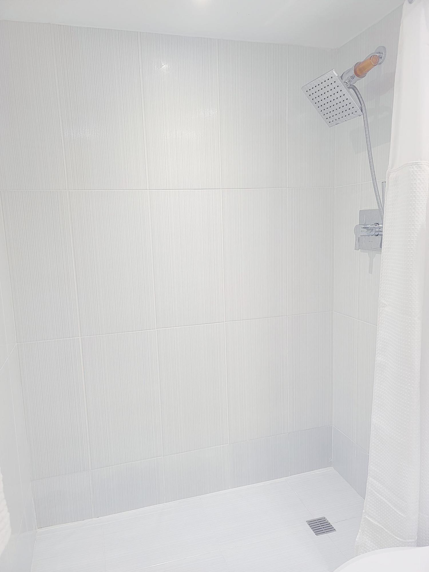 651 East Woolbright Road, Unit E204 Boynton Beach, FL 33435 - Photo 24 of 37 Guest Bathroom