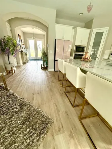 a view of a living room and dining room