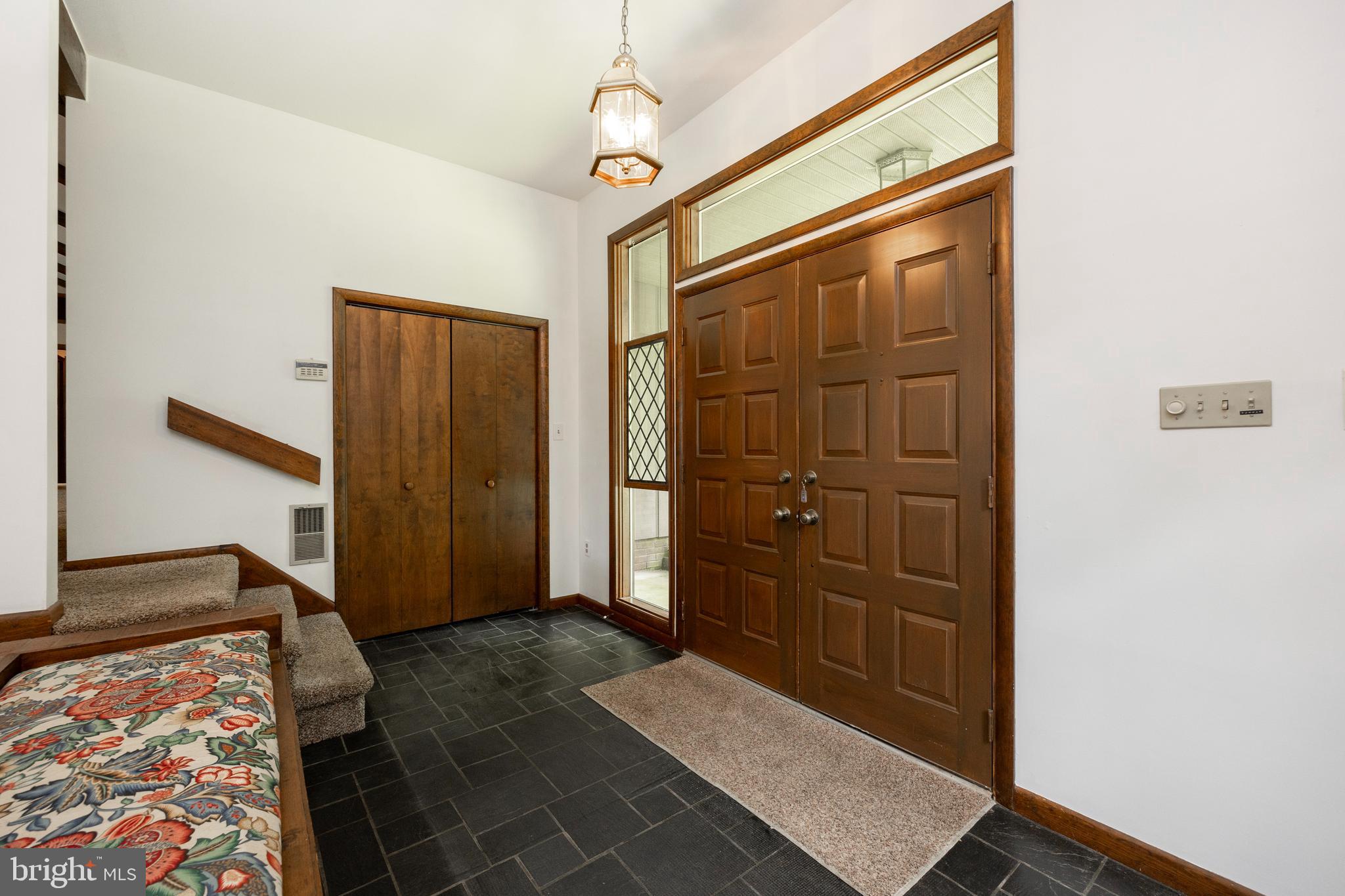 215 Downing Road Downingtown, PA 19335 - Photo 5 of 39 Vaulted Entrance Foyer with bench