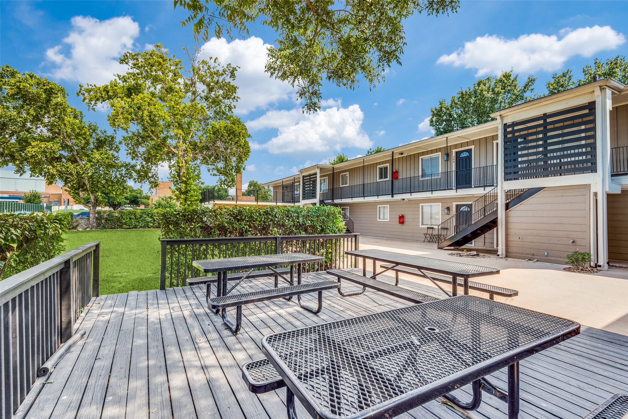 5612 Grover Avenue, Unit 101 Austin, TX 78756 - Photo 8 of 15 a view of balcony with deck and outdoor seating