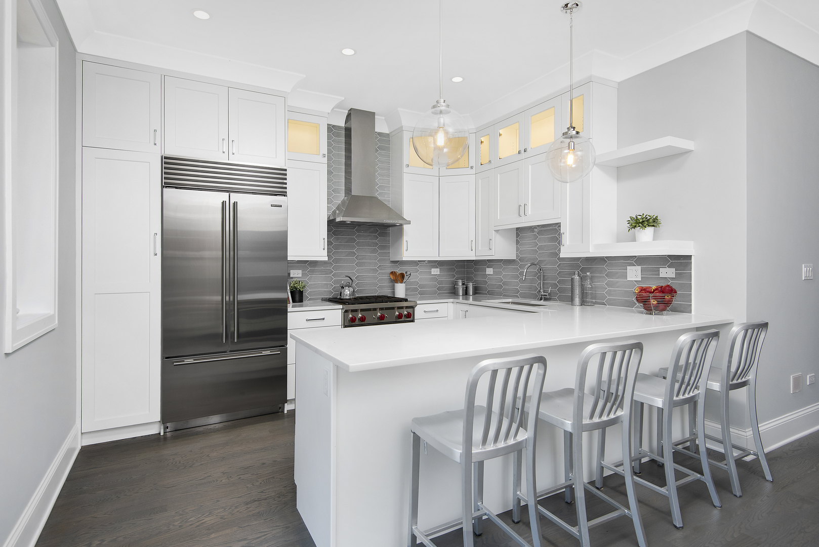 2649 North Racine Avenue, Unit 101 Chicago, IL 60614 - Photo 5 of 13 a kitchen with stainless steel appliances granite countertop a refrigerator and a stove top oven