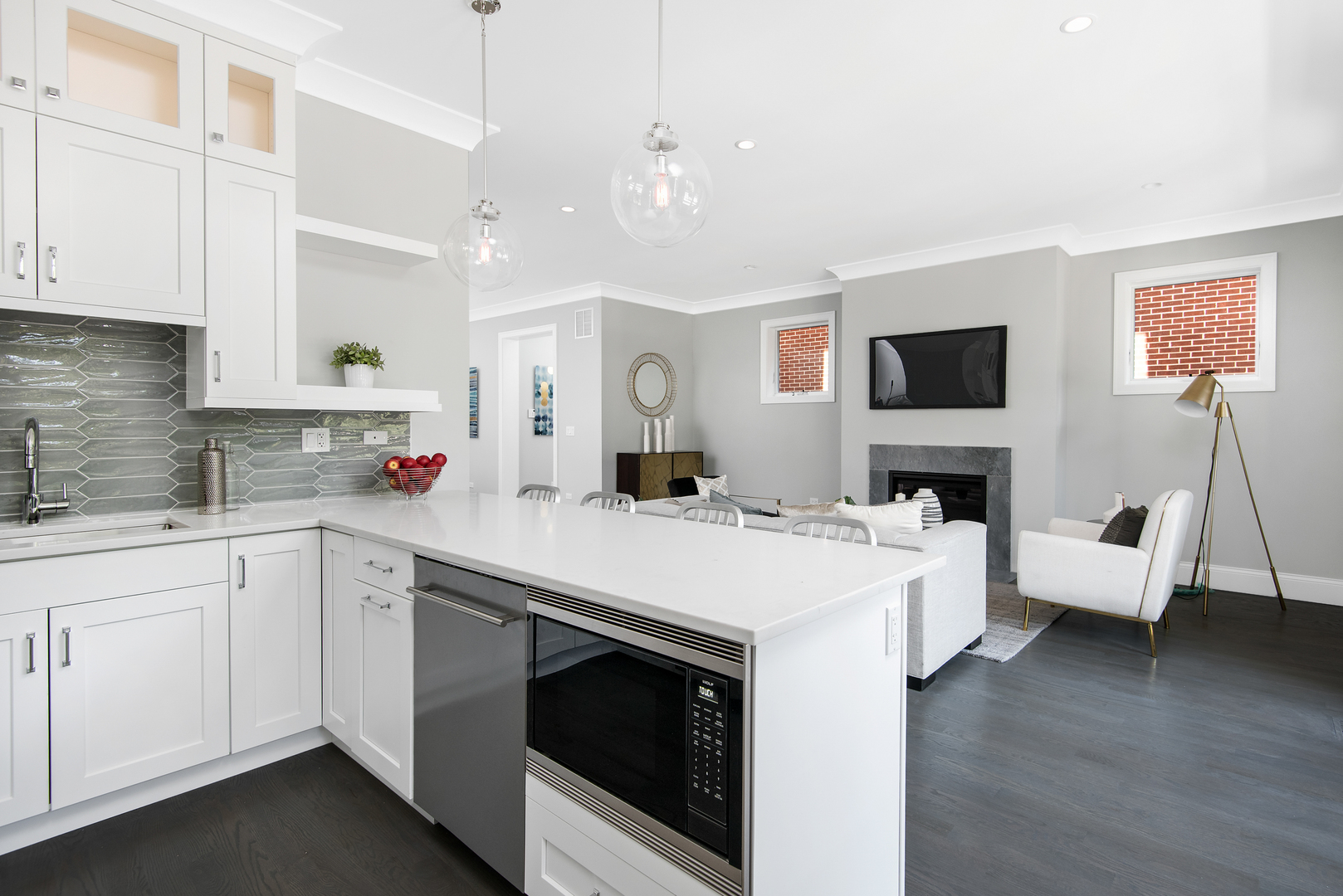 2649 North Racine Avenue, Unit 101 Chicago, IL 60614 - Photo 6 of 13 a kitchen with a sink stove and microwave