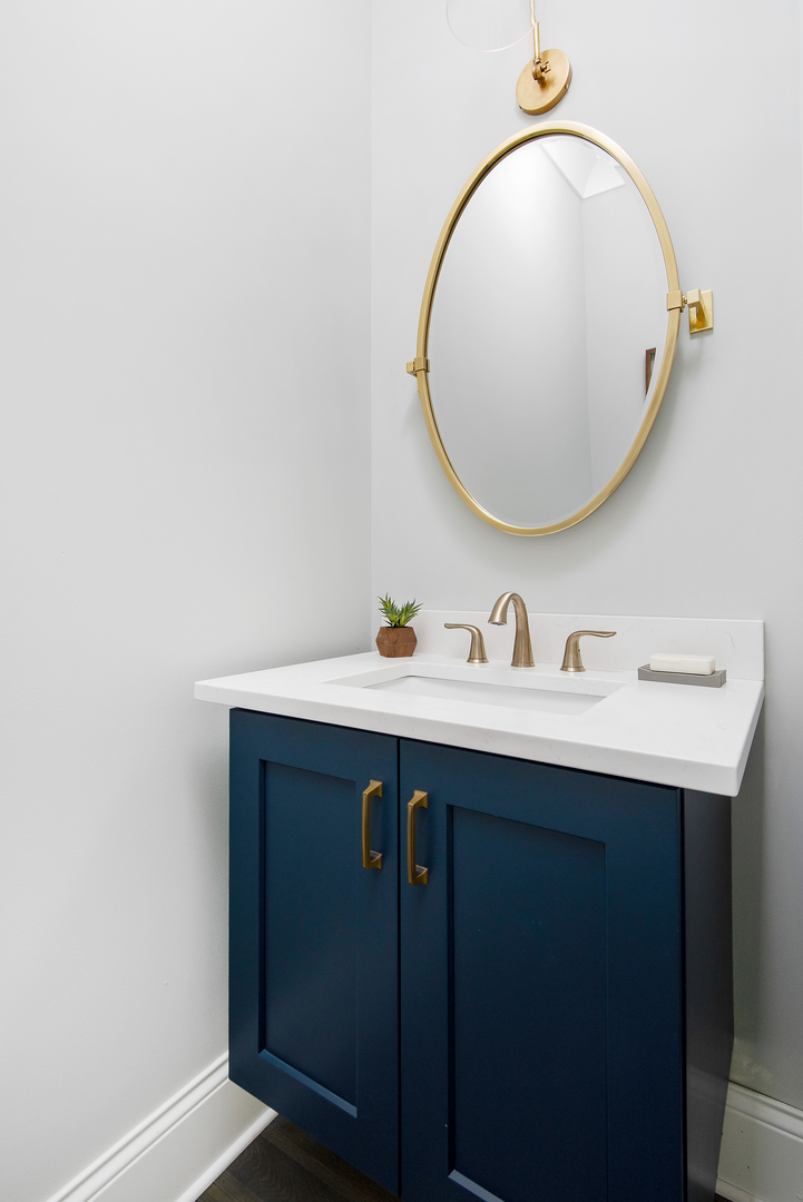 2649 North Racine Avenue, Unit 101 Chicago, IL 60614 - Photo 7 of 13 a bathroom with a sink and a mirror
