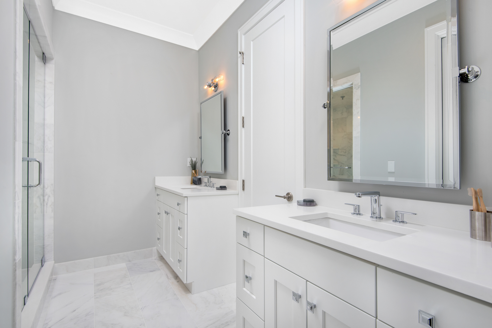 2649 North Racine Avenue, Unit 101 Chicago, IL 60614 - Photo 9 of 13 a bathroom with a sink and a mirror