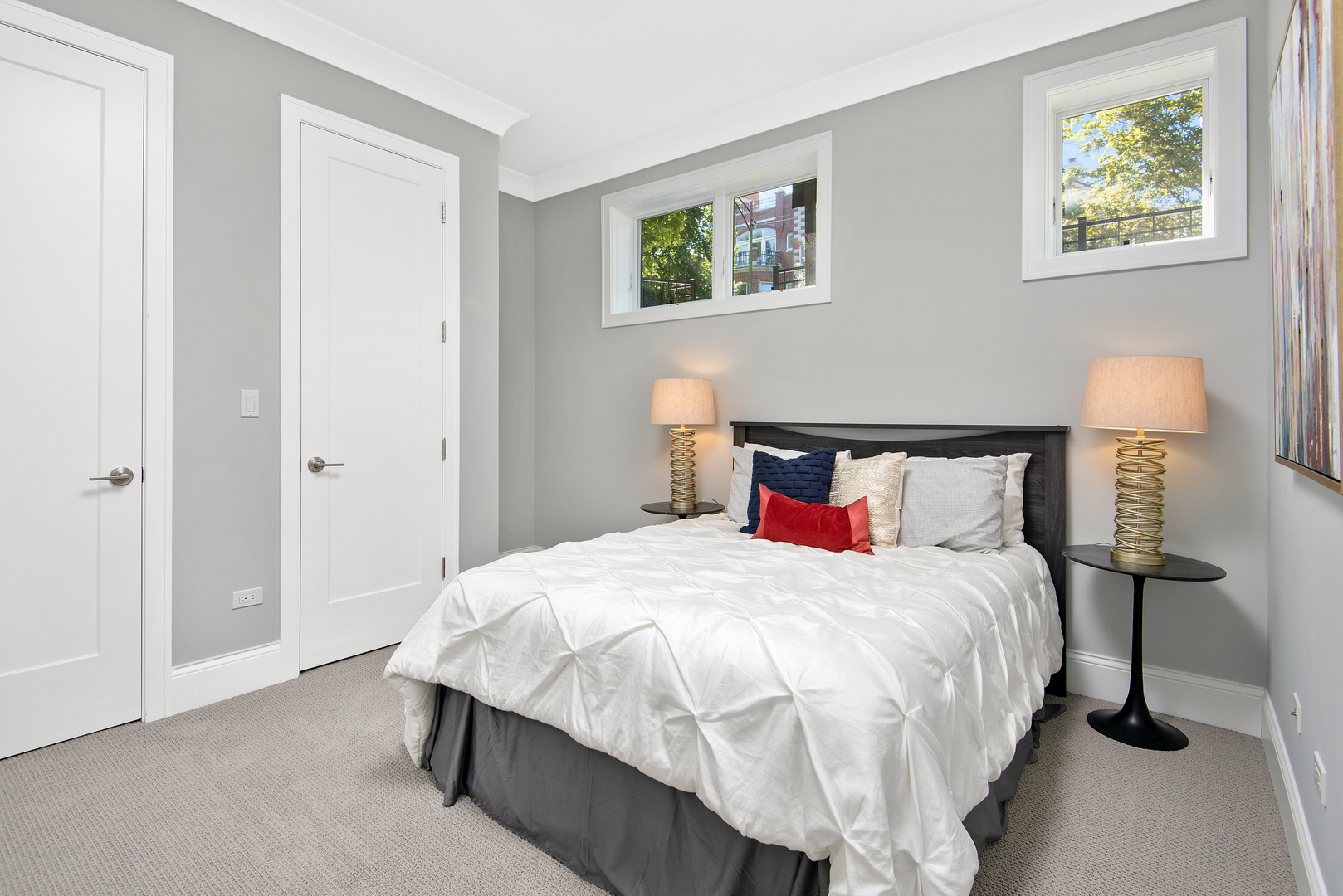 2649 North Racine Avenue, Unit 101 Chicago, IL 60614 - Photo 10 of 13 a bedroom with a bed and a night stand