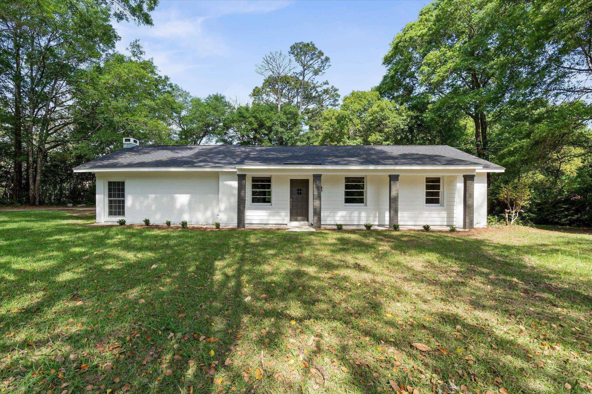 4700 Bit And Spur Road Mobile, AL 36608 - Photo 1 of 21 Ranch-style house with a front yard