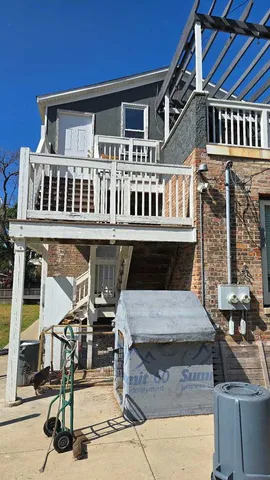 a tall building with glass windows