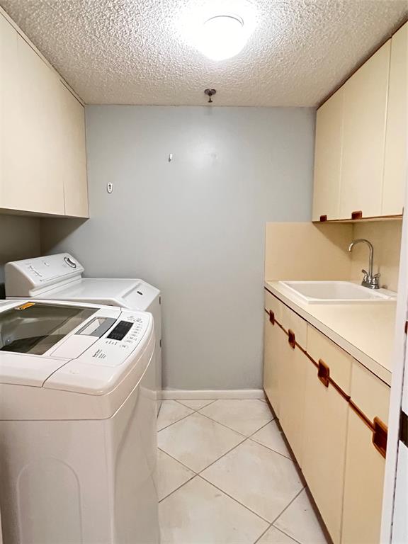 7567 Imperial Drive, Unit 201 Boca Raton, FL 33433 - Photo 14 of 41 a utility room with dryer and washer