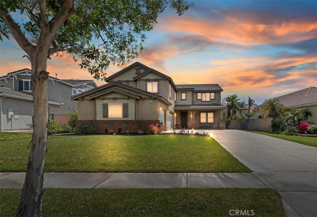 7473 Crawford Place Rancho Cucamonga, CA 91739 - Photo 1 of 1 a view of a big yard with plants and large trees