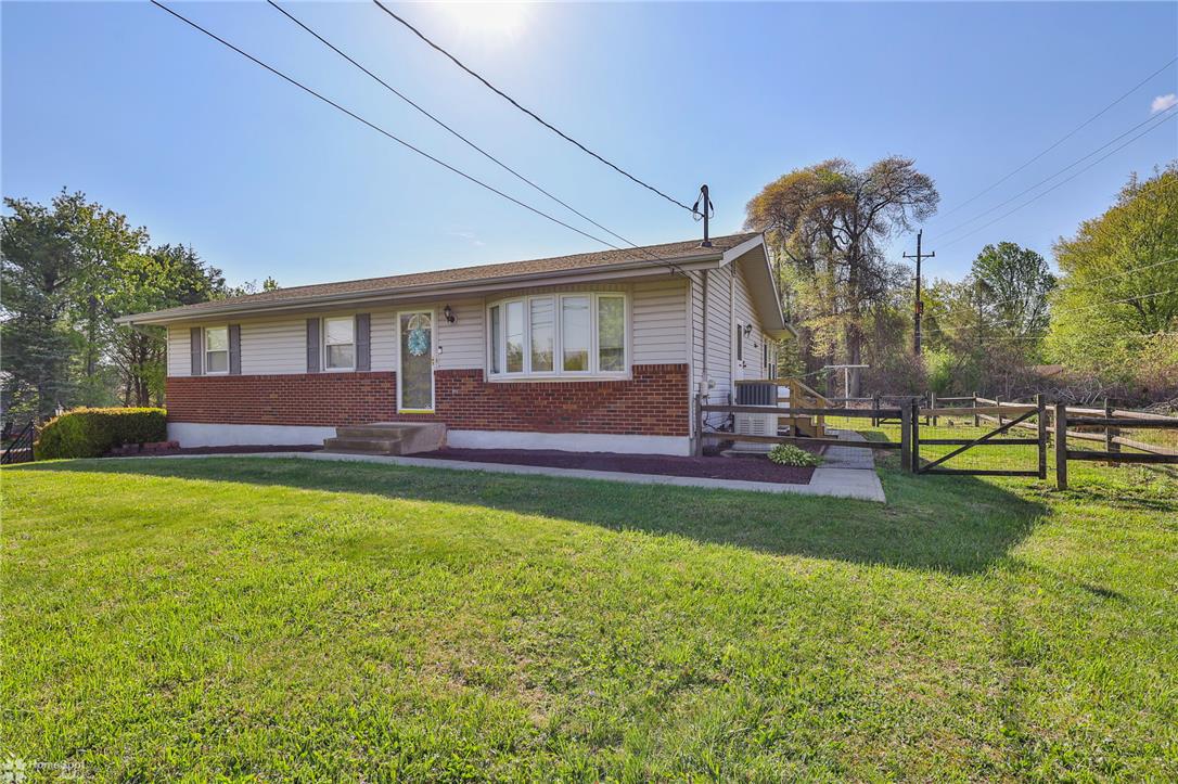 205 West Moorestown Road Wind Gap, PA 18091 - Photo 2 of 20 A well-maintained ranch home with a verdant lawn awaits its new owner.