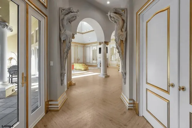 a view of a livingroom from a hallway